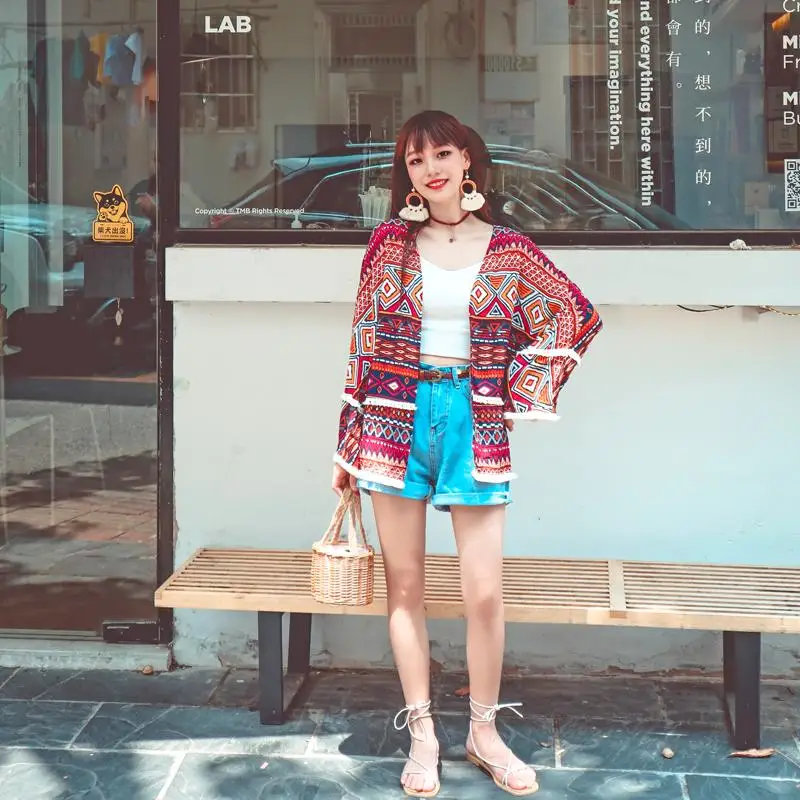 

Make qinghai lake tourism in yunnan women's cardigan national wind is prevented bask in cape tassel short coat cover new