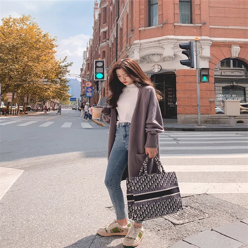 

2020 Autumn And Winter New Loose Fashion Korean Style Lazy Wind Mid Length Versatile Knitted Cardigan Sweater Female Jacket C423