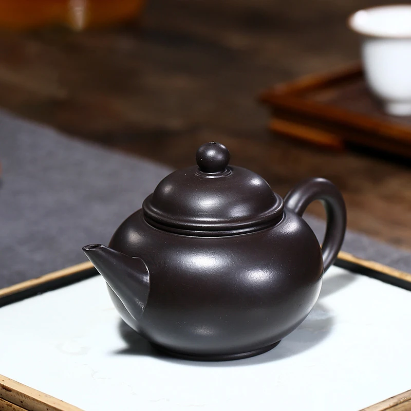 

Yixing Purple Clay Teapot All handmade raw ore black vermilion light element horizontal pot Kung Fu tea set teapot capacity 190m