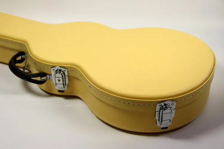 Жёлтая неопределенная коробка для электрогитары с прямой поставкой от