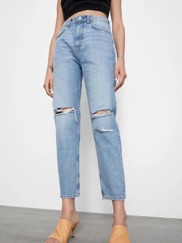 

Faded high-waist jeans Featuring five-pocket design ripped detailing on the front and zip fly and metal top button fastenins