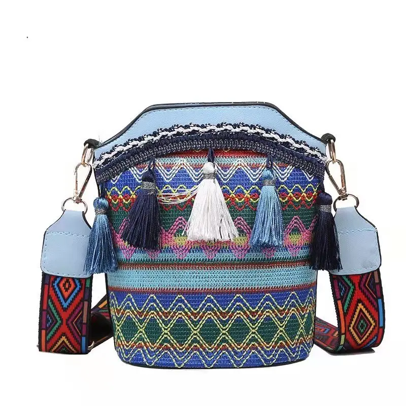 

Fashion female bag 2021 new ethnic style personality one-shoulder messenger bag tassel bucket bag woven female bag