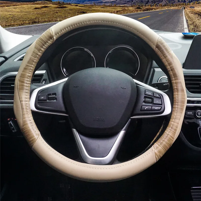 

Car steering wheel cover car handle cover four seasons universal leather medium spelling color non-slip steering wheel cover