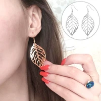 hot pendientes mujer hot fashion wholesale jewelry hollow metal leaves dangling long statement drop earrings for women