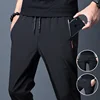 2023 New Men'S Korean Fashion Casual Summer Thin Quick Drying Ice Silk Straight Pants Loose Sports 9-Point Trousers Boy 6