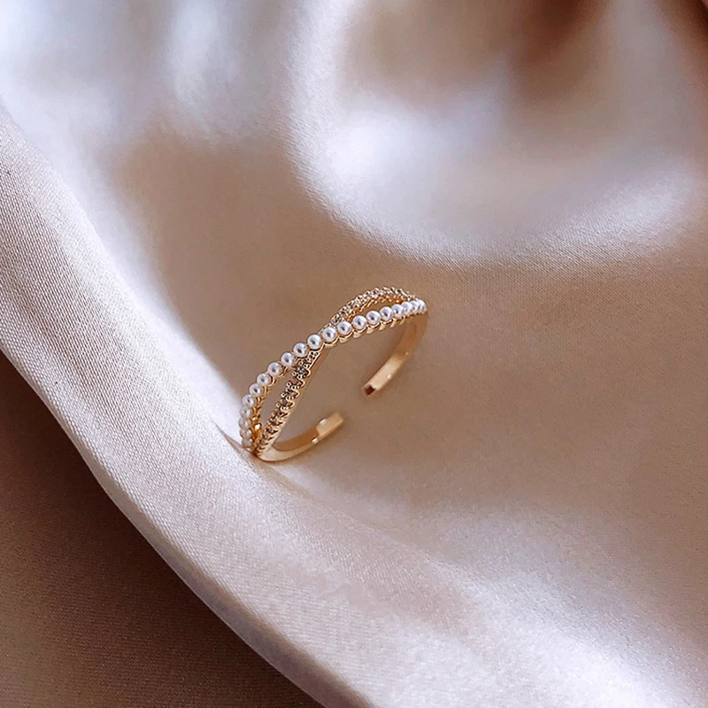 

2020 South Korean New Cross Bow Pearl Ring Female Fashion Temperament Personality Adjustable Opening Forefinger Ring