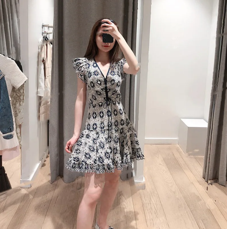 

Spring and summer new cute fresh and sweet hollow lace hook flower v-neck ruffled temperament fairy dress