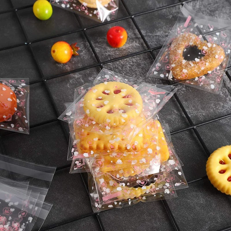 

500 Pcs Self Adhesive Cookie Bags Love Heart Printing Gift Bags Treat Bags Plastic Bag for Candy,Valentine Chocolates