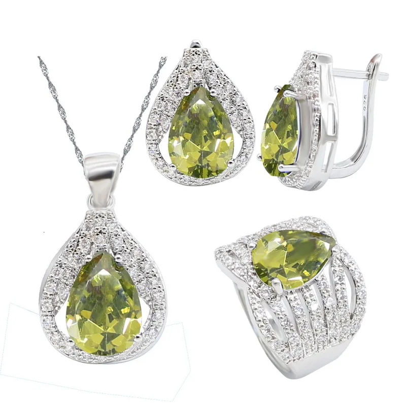 Серьги-кольца из серебра 925 пробы с зеленым хризолитом | Украшения и аксессуары