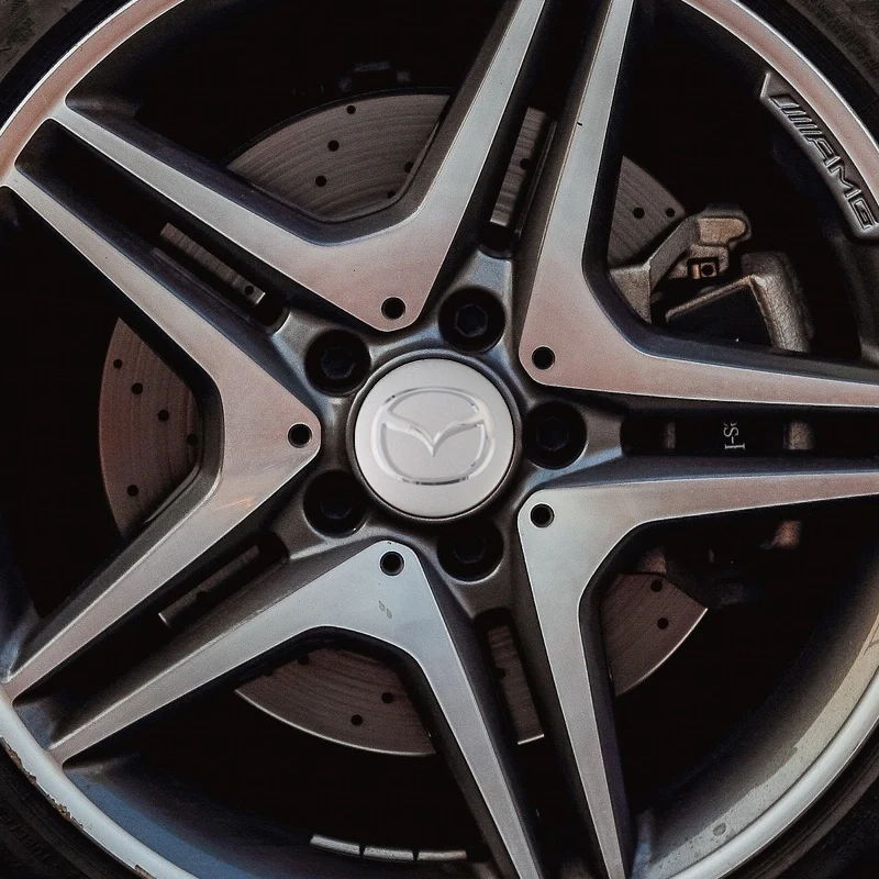 

4pcs 56/65mm Car Wheel Center Cover Stickers Emblem For Mazda 2 3 Demio DE bm bk Axela 6 gh gl Atenza 323 CX4 RX8 CX30 CX-3 CX-5