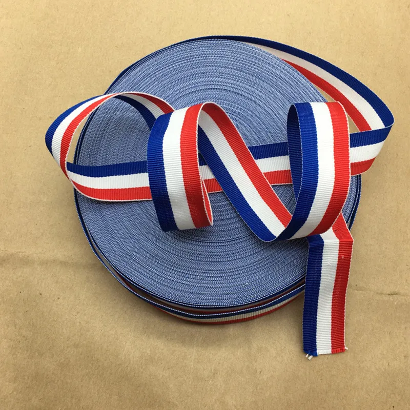 

2.5 cm polyester intercolor stripe garments with red white and blue ribbons