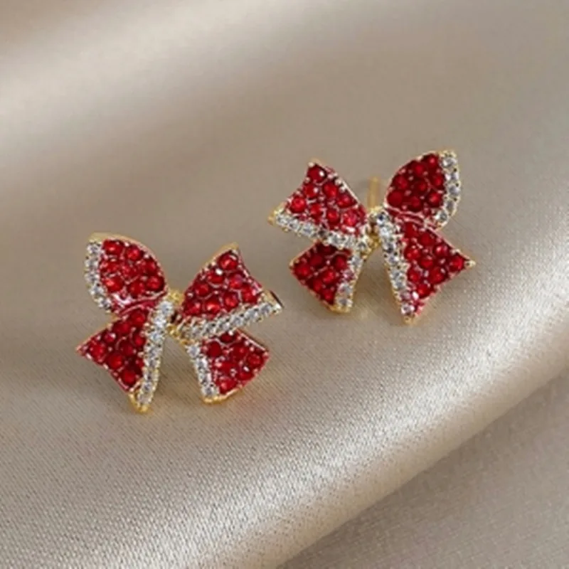 

Karopel S925 Silver Needle South Korea Dongdaemun Red Super Flash Bow Stud Earrings Female Small Net Red Temperament Ear Jewelry