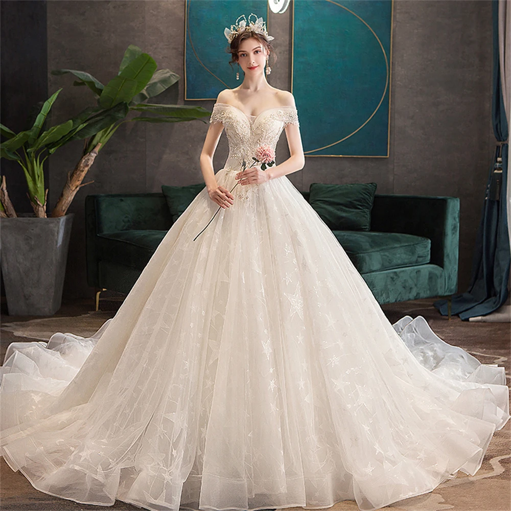 

Dioflyusa Vintage Lace Beading Sequin Romanti Luxury Tulle Princess Wedding Dress 2021 Champagne Boat Neck Plus Size Ball Gown