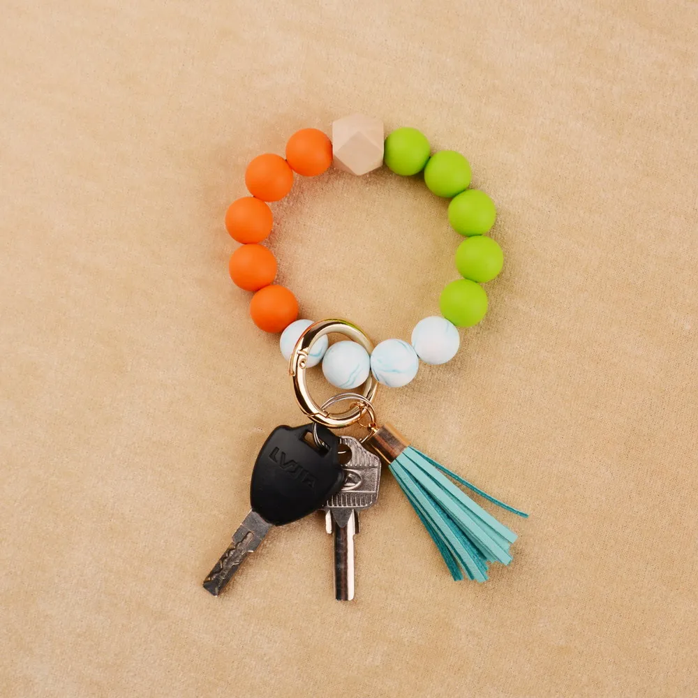 

Silicone Key Ring Bracelet Women Beaded Bangle Keychain Wristlet Leather Tassel Keychain Charms New Bracelet Pendant Accessories