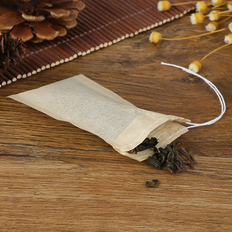 

100Pcs 6*8cm Medcine Bags Non-woven Seal Filter Drawstring Pouch Multifunction Tea Bags Coffee Pouches Cook Herb Spice Tools