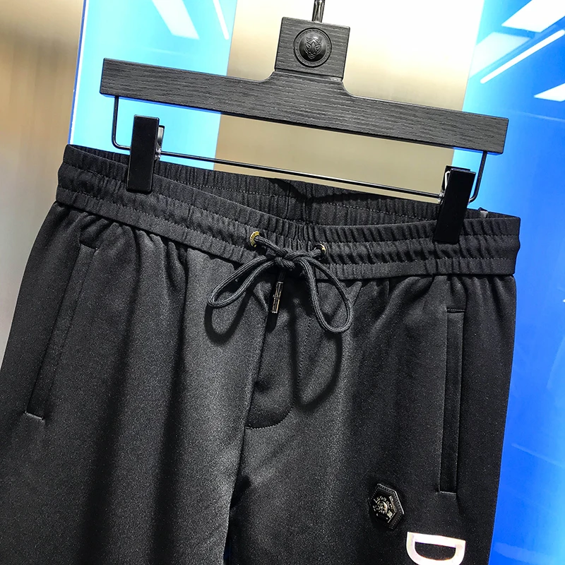 European station autumn 2020 handsome badge embroidered letters color printing fashion brand Leggings slim casual pants for men | Мужская