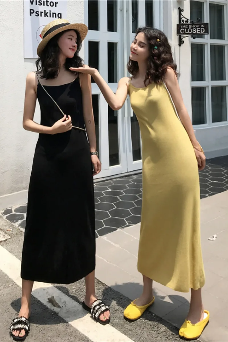 

2021 early spring new Korean style temperament casual all-match vest suspender long skirt slit slim knitted dress women