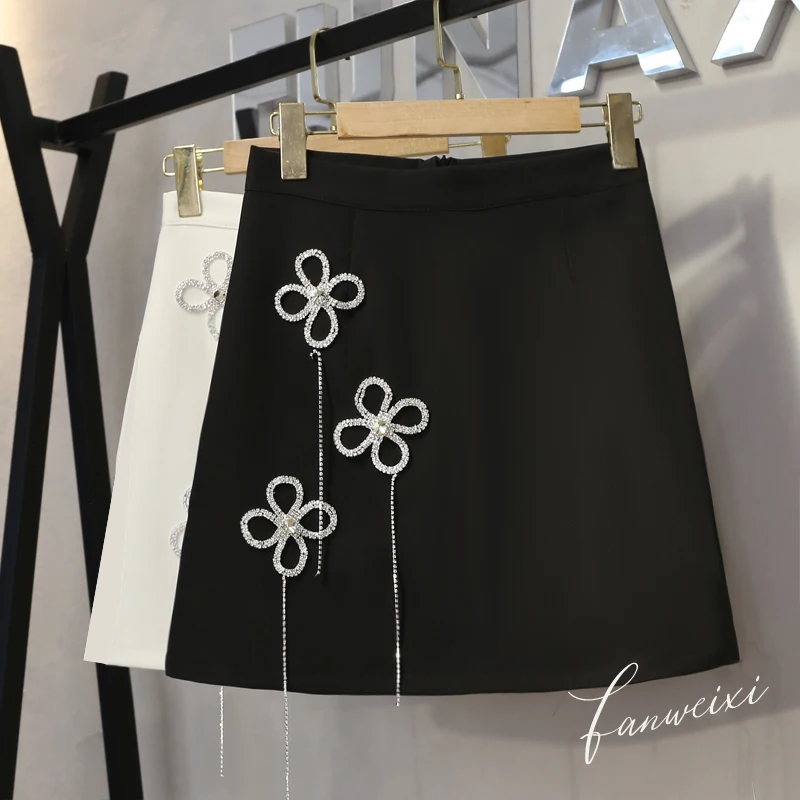 

the new design feeling heavy set auger tassel show thin short skirt of tall waist a long skirts female bag hip skirt