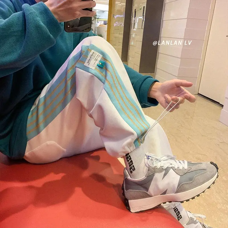 

Spring and autumn Hong Kong Style Stripe Drawstring casual legged pants joggers men for male students