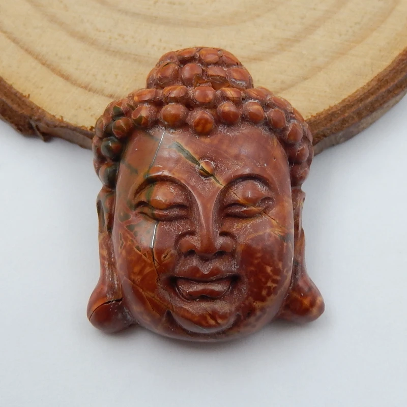 

Hot Sale Multi-color picasso Jasper Carved Buddha Head Cabochon 31x24x10mm 9.9g semiprecious Stone Fashion Jewelry Accessory