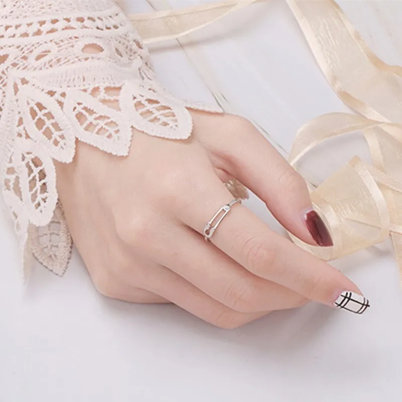 

New geometric ladies adjustable size ring personality cold wind single flash diamond open index finger joint pin ring
