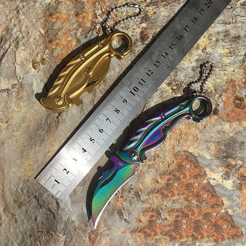 

Hot-selling Hot-selling Outdoor Titanium Gold All Steel Small Folding Knives Self-defense Portable Mini Camping Key Chain Knife