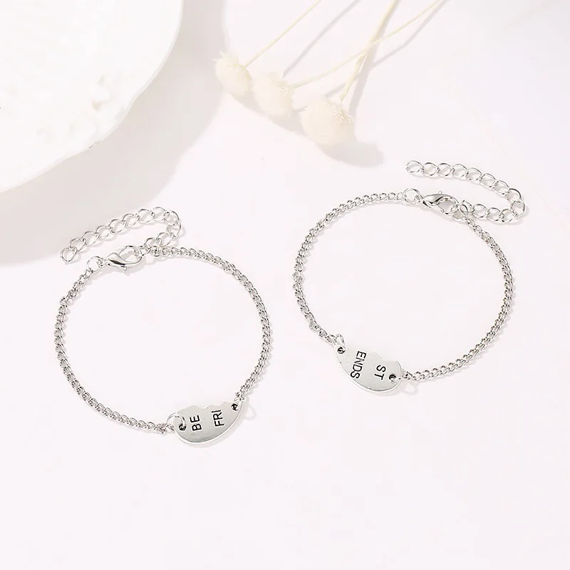 Женский браслет цепочка с сердечками серебристый металлический цепочкой 2