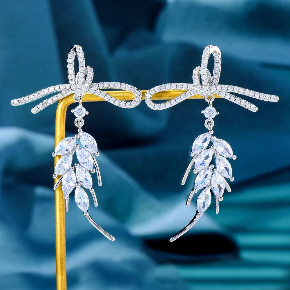 

Soramoore Cute Sweet Bowknot Feather CZ Drop Earrings Full Cubic Zirconia for Women Wedding Trendy Earrings Bijoux High Quality