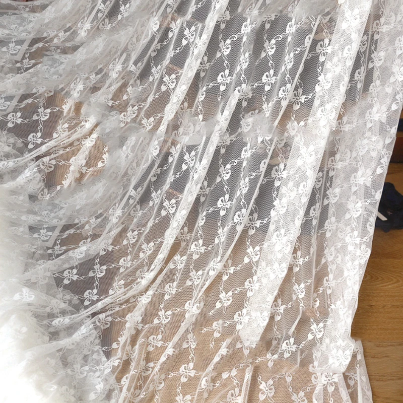 

High-Quality Stretch Bow Lace Fabric DIY Clothing Bottoming Shirt Skirt Dress Background Cloth Black And White Clothing Fabric