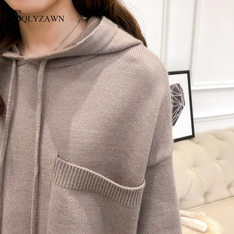 Женский трикотажный костюм свитер с капюшоном и брюки широкими штанинами