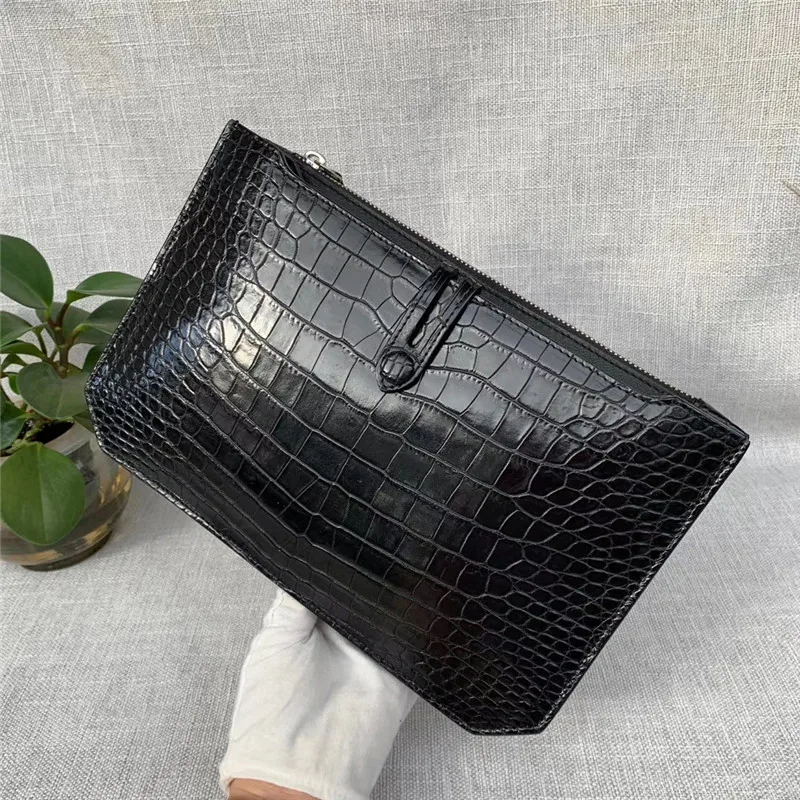 

Кошелек мужской из натуральной крокодиловой кожи с ремешком на запястье