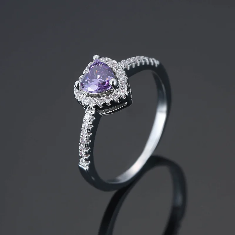Серебряное кольцо с аметистом сердцем и драгоценными камнями синим сапфиром