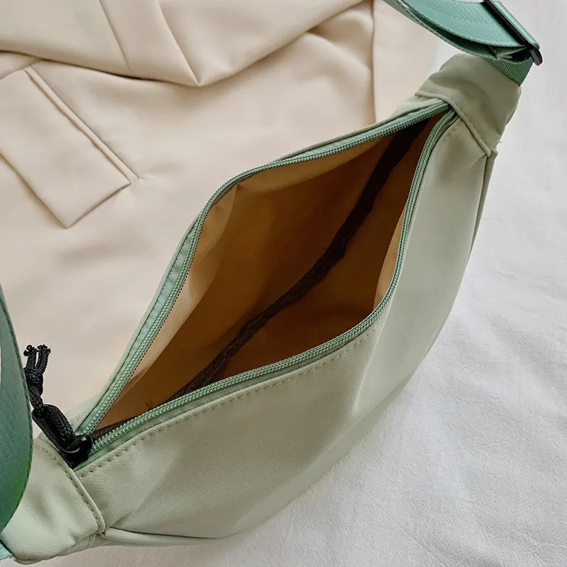 

DOLOVE Nylon Dumpling Bag Women's 2021 New Fashion Korean Fashion Simple One Shoulder Net Red Large Capacity Messenger Waist Bag