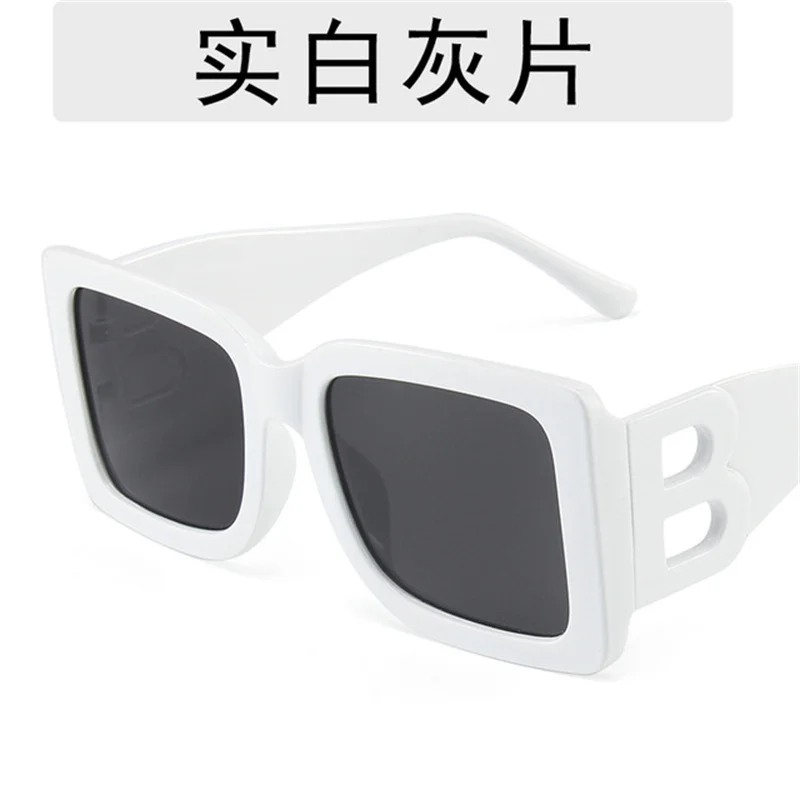 

New personality modern modelling sunglasses glass leg hollow-out B word sunglasses female big frame square street shot