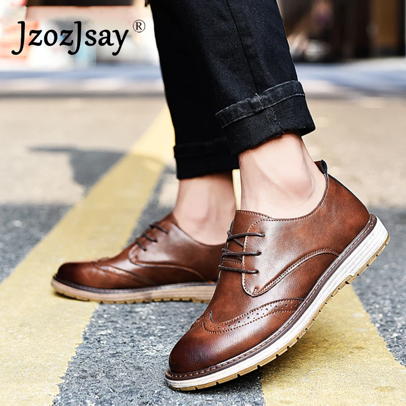 Мужские туфли броги с резным кружевом классические черного цвета деловые