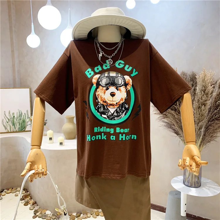 

Summer 2021 New Cartoon Pattern Letter Printed Short-Sleeve T-shirt High Waist Irregular Skirt Two-Piece Set for Ladies