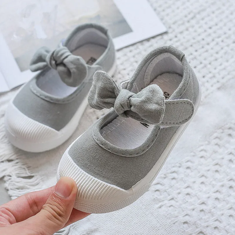 

HOT four seasons Bow knot children's casual shoes princess small fresh flat soft sole sprinting breathable, canvas shoes