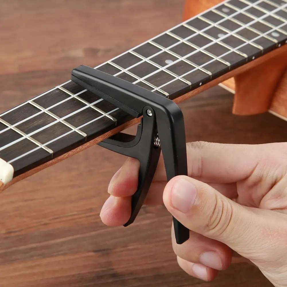 

Пластик каподастр для 6 String Акустическая классическая бас Электрогитары миниатюрная гитара укулеле быстрой смены тюнинг-зажим Аксессуары ...