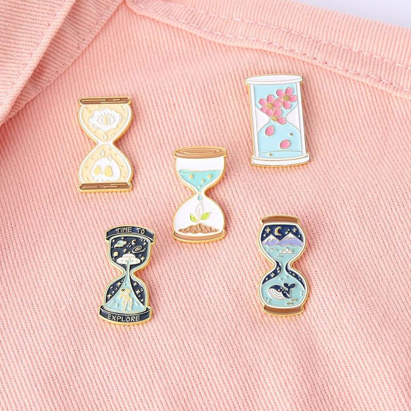 

Hourglass Cherry Blossom Enamel Lapel Pins Custom Hourglass Space Ocean Brooches Backpack Badge Jewelry Gift for Kids Wholesale