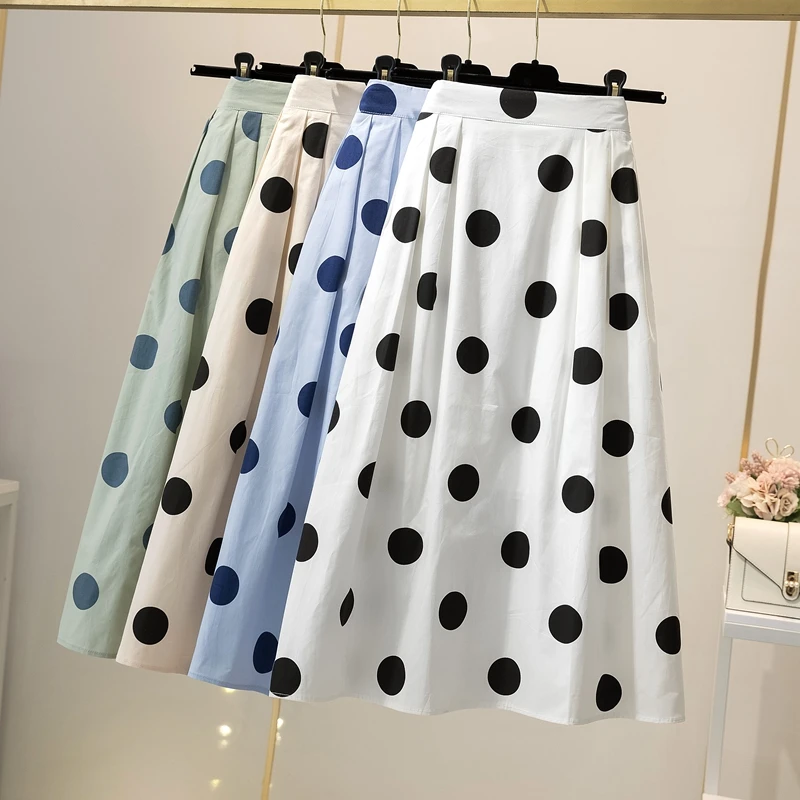 

Милая плиссированная хлопковая юбка А-силуэта в горошек с боковыми карманами