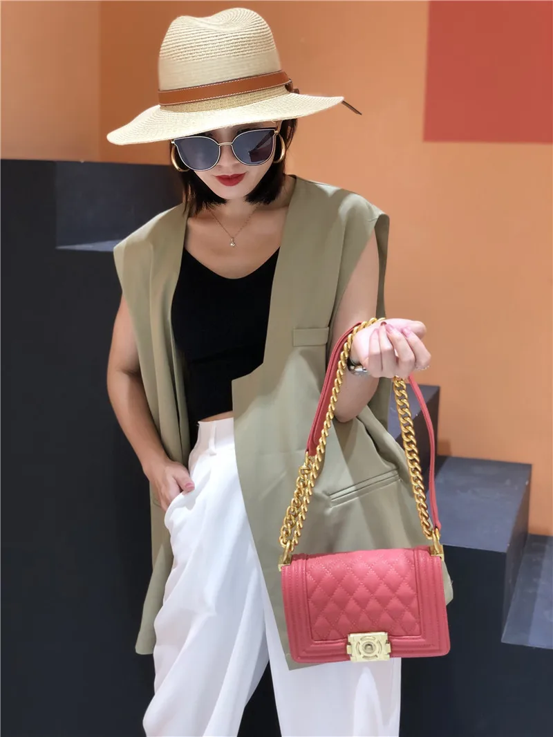 

2021 summer new luxury leather shoulder bag caviar spherical pattern flip leather messenger bag spicy mom fashion handbag trend