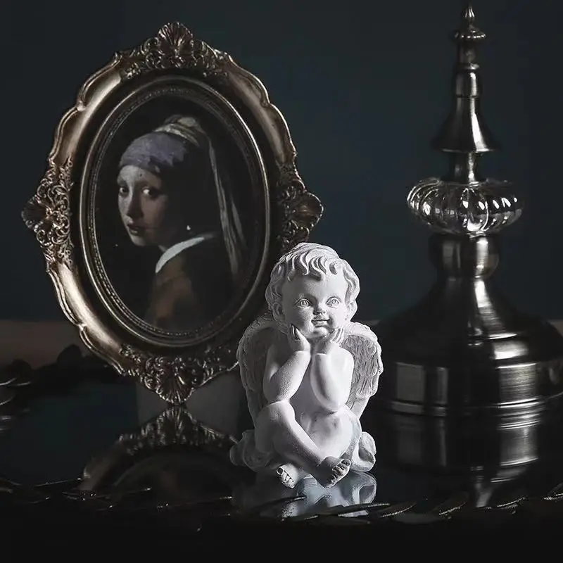 

Lovely simple wind child angel holding chin boy angel resin handicraft ornaments living room porch bedroom ornaments