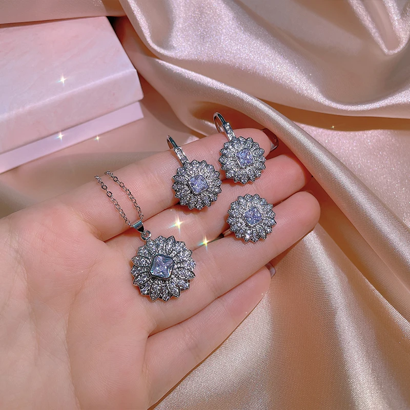 

2023 New Shiny Zircon Jewelry Set Flower Shape Ring Earring Necklace Temperament Jewelry Wedding Bridal Silver Jewelry Set