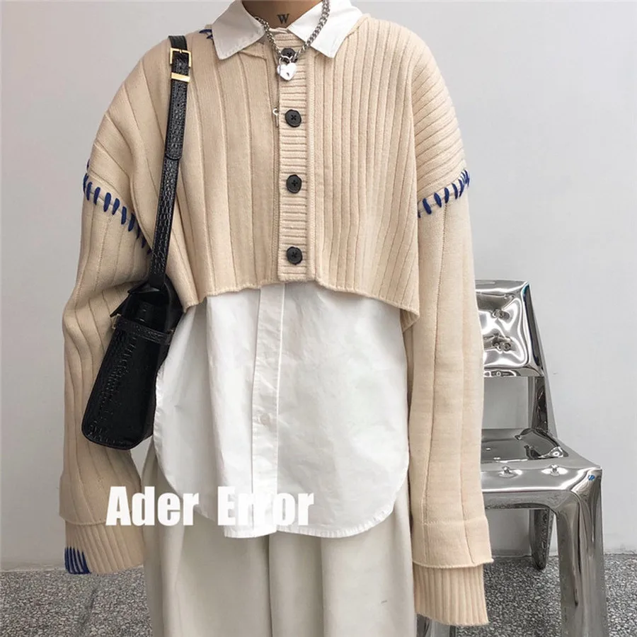 

ADER ERROR Cardigans Men Women Front Short Back Long Adererror Sweater Leatherwear Logo ADER Sweaters Inside Tag