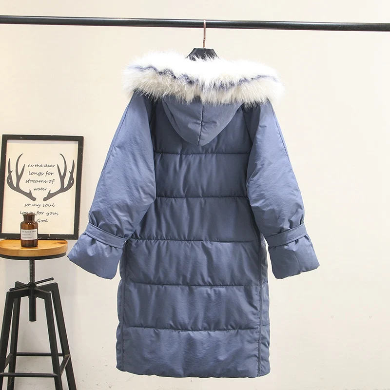 Женская зимняя куртка с капюшоном длинная однотонная модная меховым воротником