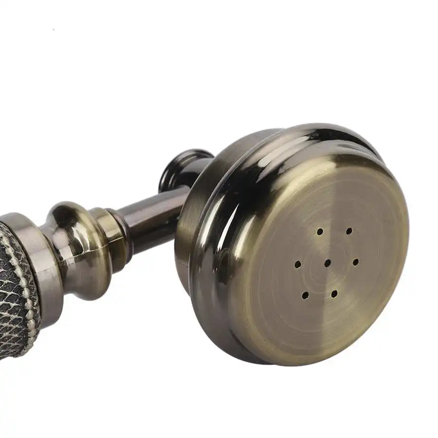 Старинный ретро телефон с вращающимся циферблатом старинный в классическом