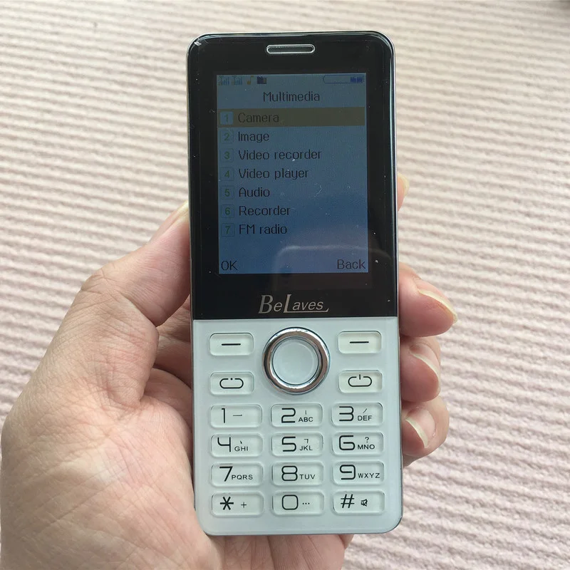 Belaves SF01 кнопочный мобильный телефон 2,6 дюймов сенсорный экран Две sim-карты Bluetooth фонарик MP3 FM камера BigHorn сотовый телефон от AliExpress WW