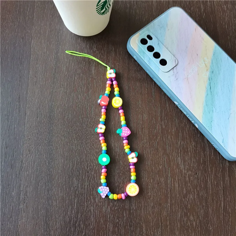 2021 New Colorful Rice Beads Mobile Phone Chain Female Cute Soft Pottery Fruit Beaded Hanging Jewelry Accessories |
