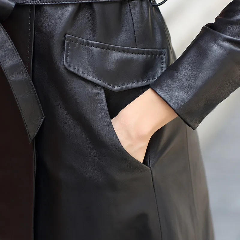 Abrigo clásico de piel de oveja auténtica para mujer, chaqueta de piel de oveja auténtica de longitud media, con bolsillos y fajas, color negro