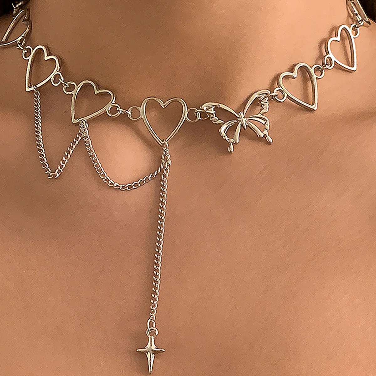 

Бесплатная доставка, ювелирные изделия, панк, полые, сердце, Бабочка, ожерелье до ключиц, Женская цепочка с кисточкой, ожерелье с крестом